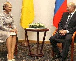 Путин пообещал Тимошенко вакцину от свиного гриппа