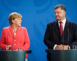 Меркель: Путина уведомят о результатах трехсторонних переговоров