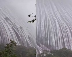 Возникло невероятное зрелище: гора после мощного ливня превратилась в водопад (видео)