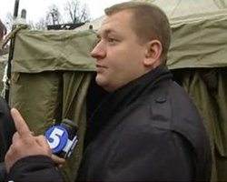 Обнародовано видео конфликта охраны Азарова с журналистами