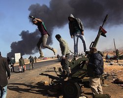 Повстанцы рассчитывают брать родной город Каддафи более 10 дней