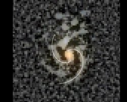 Схожа на Чумацький Шлях: виявлено найранішу спіральну галактику з перемичкою (фото)