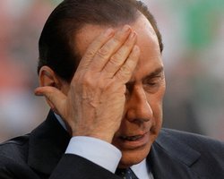 Суд Милана приговорил Берлускони к четырем годам тюрьмы