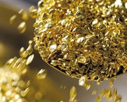 Золото подешевело ниже уровня в 1500 долларов за унцию