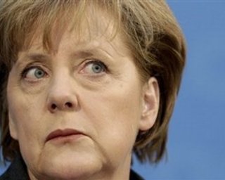Представители украинской оппозиции встретились с Меркель и передали ей открытку от Тимошенко