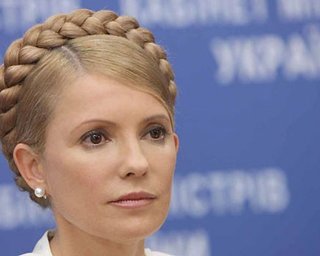 Тимошенко продолжит раздавать свою тысячу после выборов
