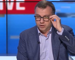 "Хабар у 100 тис. доларів": суд заарештував майно брата голови ОАСК Павла Вовка