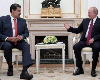 Путин принял Мадуро в Кремле и пообещал ему помощь