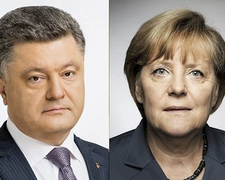 Меркель поздравила Порошенко с выходом во второй тур выборов