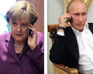 Путин предупредил Ангелу Меркель не лезть в дела Беларуси