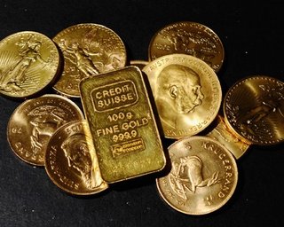 Опасаясь дефолта в США, инвесторы взвинтили цены на золото