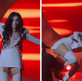 Охоронець тягнув за ногу: Анна Трінчер в сміливому міні й декольте впала на сцені (відео)