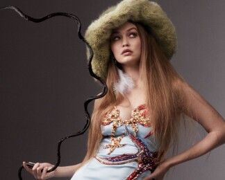 Джиджи Хадид поймали папарацци в аэропорту с дочерью (фото)