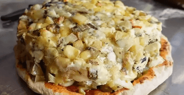 "Справжній подвиг": піца зі 1001 сортом сиру потрапила до Книги рекордів Гіннеса (фото, відео)