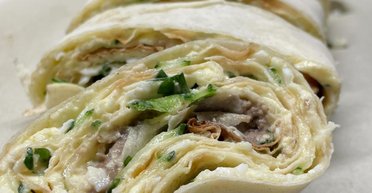 Рулет із лаваша зі шпротами: як швидко приготувати смачну закуску