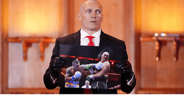 Деньги пойдут на ВСУ: Усик хочет продать фото нокдауна, подписанное Фьюри (видео)