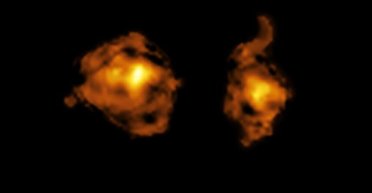 Таке побачили вперше: одна галактика вбиває іншу за допомогою пожирача матерії (фото)