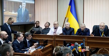 Не говорит и не показывает Янукович. Как в Киеве судят экс-президента