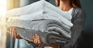 Який копійчаний засіб зможе відіпрати будь-який рушник: будуть як нові