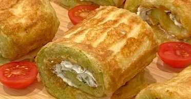 Закуска №1: рецепт соковитих кабачкових рулетів із начинкою