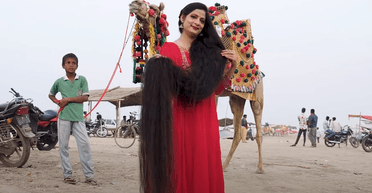 Не стриглася 14 років: який вигляд має жінка з найдовшим волоссям у світі (фото, відео)