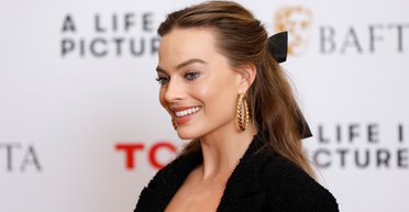 Команда мечты: фейковый трейлер "Бонда" с Генри Кавиллом и Марго Робби стал сенсацией