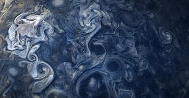 Газові циклони в атмосфері Юпітера схожі на океани Землі: як це може бути