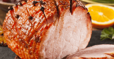 Тушкована в пиві шинка з діжонською гірчицею: неповторний смак ароматного м'яса