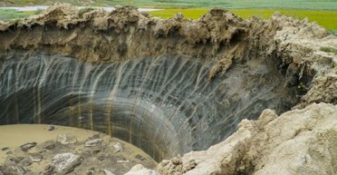 Сибирская тундра спонтанно взрывается: на поверхности остаются воронки глубиной до 50 метров