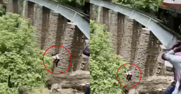 Захопилися фотографуванням: подружжя зістрибнуло з мосту в ущелину, рятуючись від поїзда (відео)