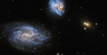 Множинний канібалізм: телескоп Габбл побачив цікаве зіткнення галактик (фото)