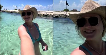 Неуважна жінка плавала в океані, не помітивши, що відбувається позаду неї (фото)