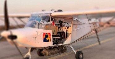 Ленинградскую область РФ "бомбардировал" самолет А-22: летел на уровне деревьев и нес авиабомбу (видео)