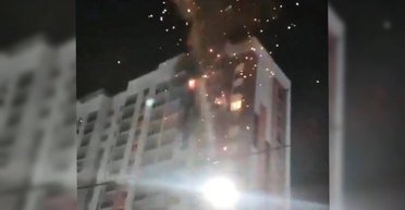 Десятки дронов, пораженный аэродром, нефтебаза и жилой дом: детали атаки по России (видео)