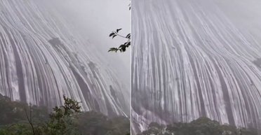 Постало неймовірне видовище: гора після потужної зливи перетворилася на водоспад (відео)