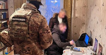 В Харькове доцент вуза корректировал удары РФ по городу и "охотился" на волонтеров, — СБУ (фото)