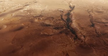 Політ над поверхнею Марса: зонд Mars Express показав покриту "шрамами" планету (відео)