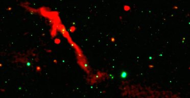 Черная дыра проснулась после 100 млн лет сна: астрономы показали, как это было (фото)