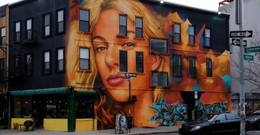 В Нью-Йорке появился мурал, с портретом убитой украинской беженки Ирины Заруцкой (фото)