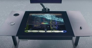 Замена ПК: стол оснастили прозрачным OLED-экраном и встроенным системным блоком (видео)