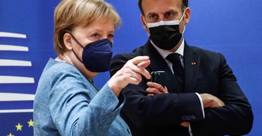 Свои интересы. Зачем Меркель и Макрон приглашали Путина на саммит ЕС и почему их никто не поддержал