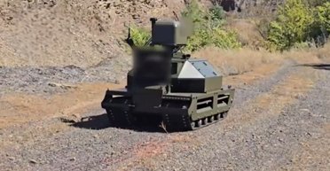 "Стреляет" лазером на 150 м: в РФ показали нового наземного робота "Игнис" (видео)