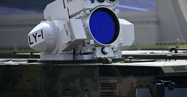 "Будущее современной войны": Китай показал новейшие дроны с ИИ и лазерное оружие (видео)