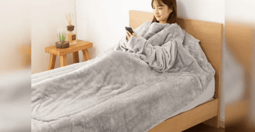 В Японии придумали "одеяло для смартфона": почему его прозвали таким, что "губит людей" (фото)