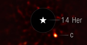 Уперше астрономи отримали фотографію замороженої планети в дуже дивній системі (фото)