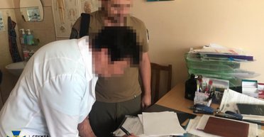На Киевщине разоблачили взяточников из ТЦК и ВВК, которые получили от уклонистов 10 млн грн (фото)