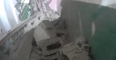 "Среди пыли, дыма и боли": в Харькове мужчина под завалами пел гимн Украины (видео)