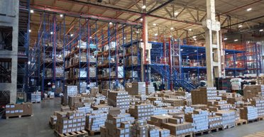 Стелажі поїдуть до людей. EVA впровадить нову логістичну систему з роботами, які зможуть автоматично пересувати складські секції