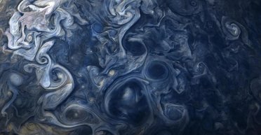 Велика блакитна пляма на Юпітері: звідки взялася аномалія і якого вона кольору