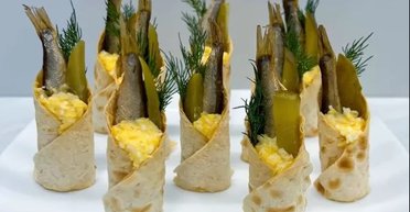 "Новорічний салют": красива закуска на святковий стіл зі шпротами